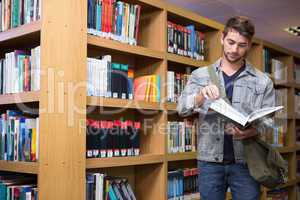 Student reading in library