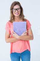 Pretty geeky hipster holding notepad