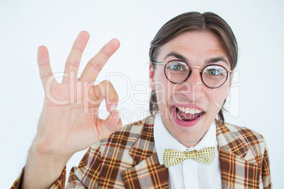 Geeky hipster doing the ok sign