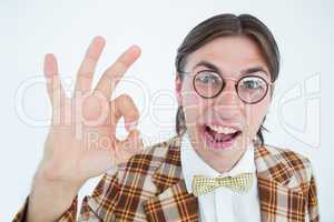 Geeky hipster doing the ok sign