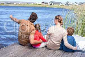 Happy family at a lake