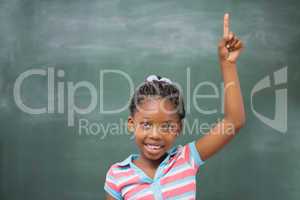 Pupils raising hand in classroom