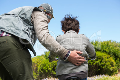 Father and son on a bike ride