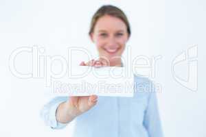 Businesswoman showing her business card