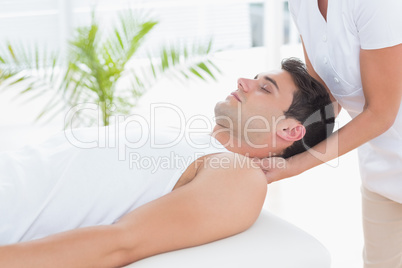 Man receiving neck massage