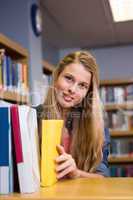 Pretty student in the library