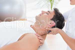 Man receiving neck massage