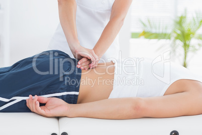 Physiotherapist doing back massage Physiotherapist doing back massage