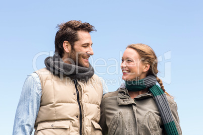 Happy couple smiling at each other