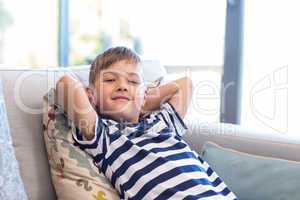 Little boy smiling on the couch