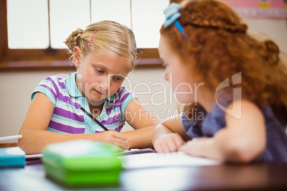 Pupils working hard at desk