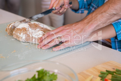 Happy family preparing lunch together