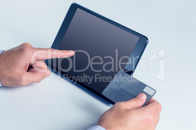 Man using tablet for online shopping