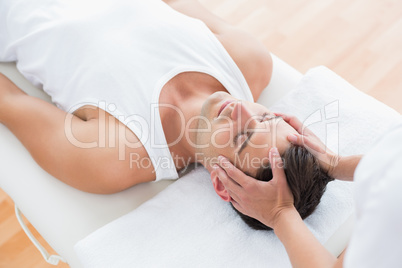 Man receiving head massage