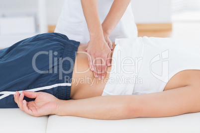 Physiotherapist doing back massage