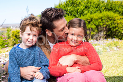 Happy father with his children