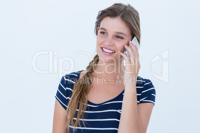 Smiling woman using smartphone