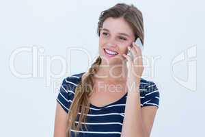 Smiling woman using smartphone