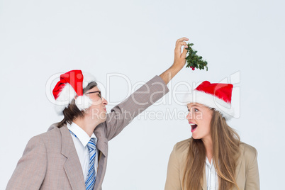 Geeky hipster with mistletoe