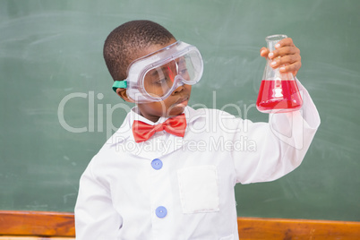 Focus pupil looking at red liquid