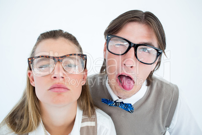 Funny geeky hipsters grimacing