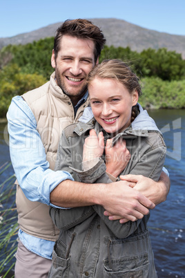 Happy couple at a lake