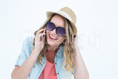 Smiling woman calling with her smartphone