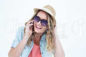 Smiling woman calling with her smartphone