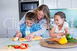 Happy family preparing lunch together