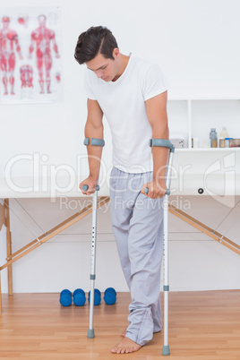 Patient walking with crutch