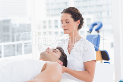 Man receiving neck massage