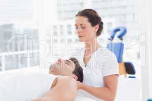 Man receiving neck massage