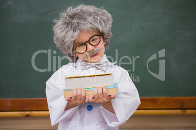 Dressed up pupil holding books