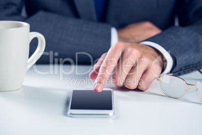 Businessman using his smart phone