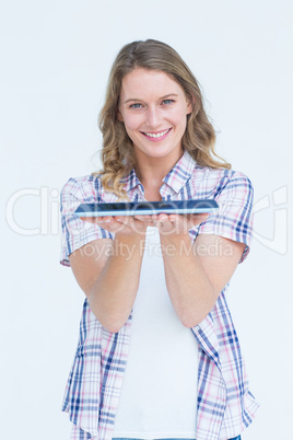 Pretty hipster showing tablet