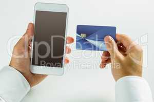 Man using smartphone for online shopping