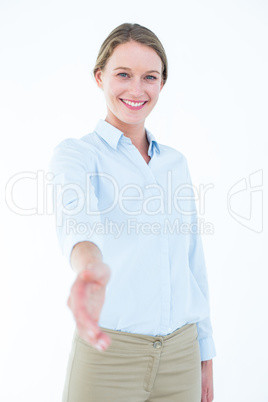 Smiling businesswoman offering handshake