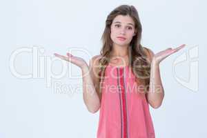 Unsure woman gesturing do not know sign