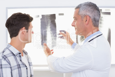 Doctor explaining X rays to his patient