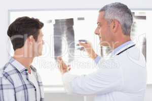 Doctor explaining X rays to his patient