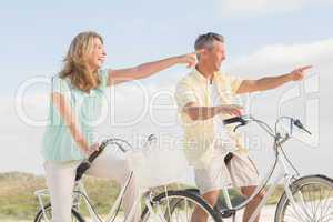 Happy couple on a bike ride