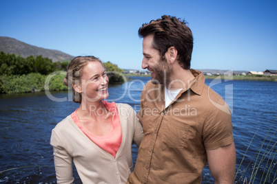 Happy couple at a lake