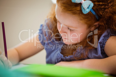 Pupil working hard at desk