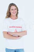 Blood donor standing arms crossed