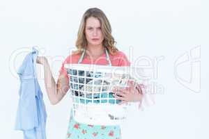 Woman holding dirty clothes