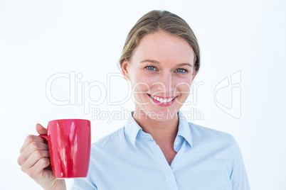 Smiling businesswoman looking at camera