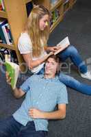 Students reading together in the library