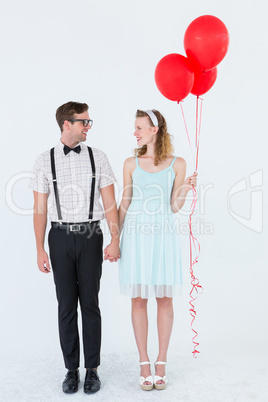 Geeky hipster couple hands in hands