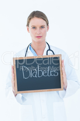 Doctor holding blackboard