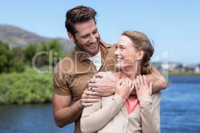 Happy couple at a lake